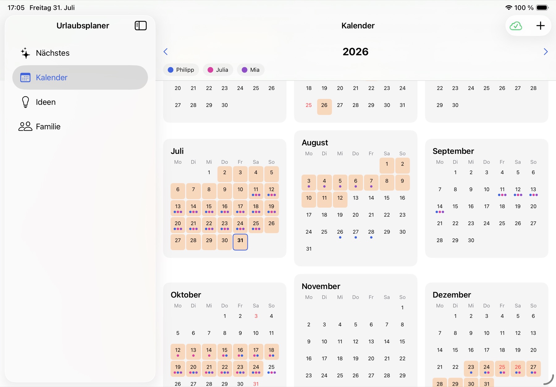 Jahreskalender auf dem iPad: drei Monatsspalten nebeneinander mit hinterlegten Ferien